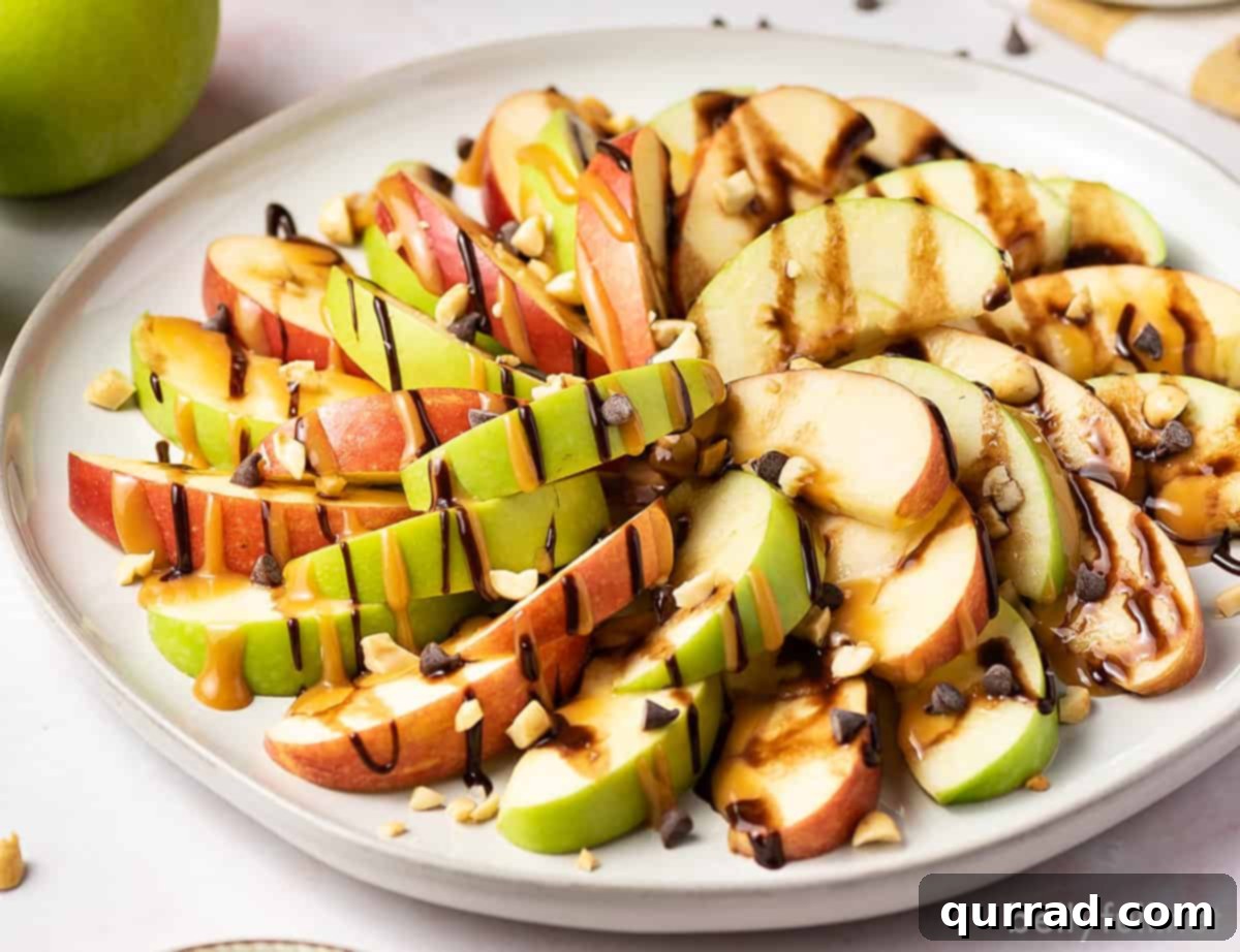 A beautifully arranged plate of apple nachos, ready to be served, showcasing the vibrant colors and enticing textures.