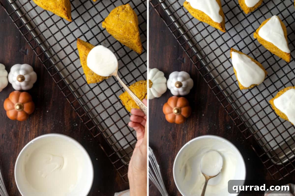 Pumpkin scones being spooned with white vanilla glaze