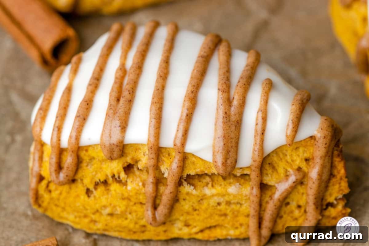 Beautifully glazed pumpkin scones, ready to eat