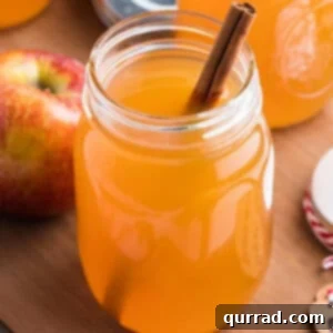 A mason jar of apple pie moonshine