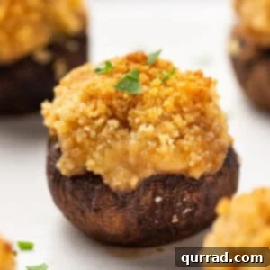 Velvet Crab Stuffed Mushrooms 6 Close-up of a crab and cream cheese stuffed mushroom