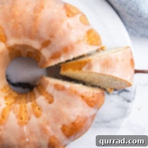 Overhead view of Kentucky butter cake with one piece sliced