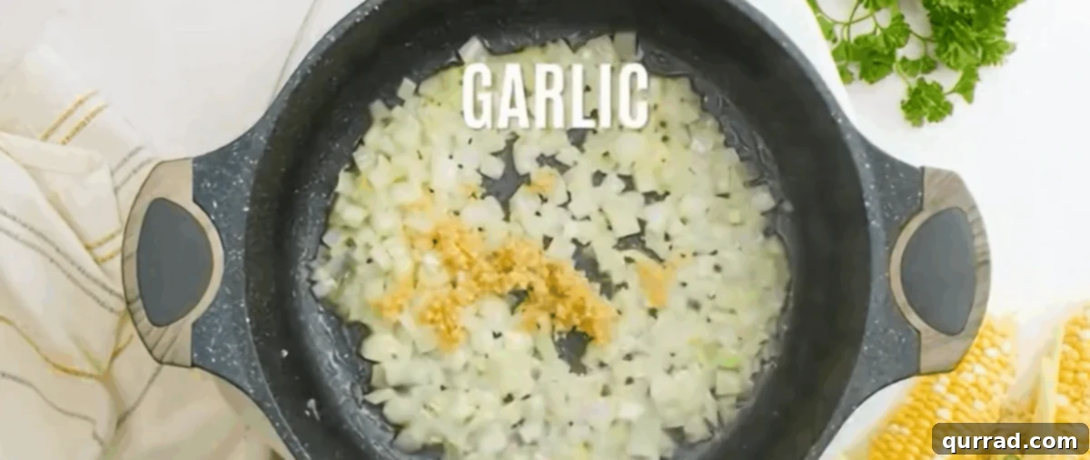 Golden Harvest Cream 4 Cooking garlic and onions in butter in a black skillet until translucent.
