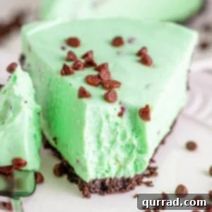 Close-up of a slice of mint chocolate chip no bake cheesecake