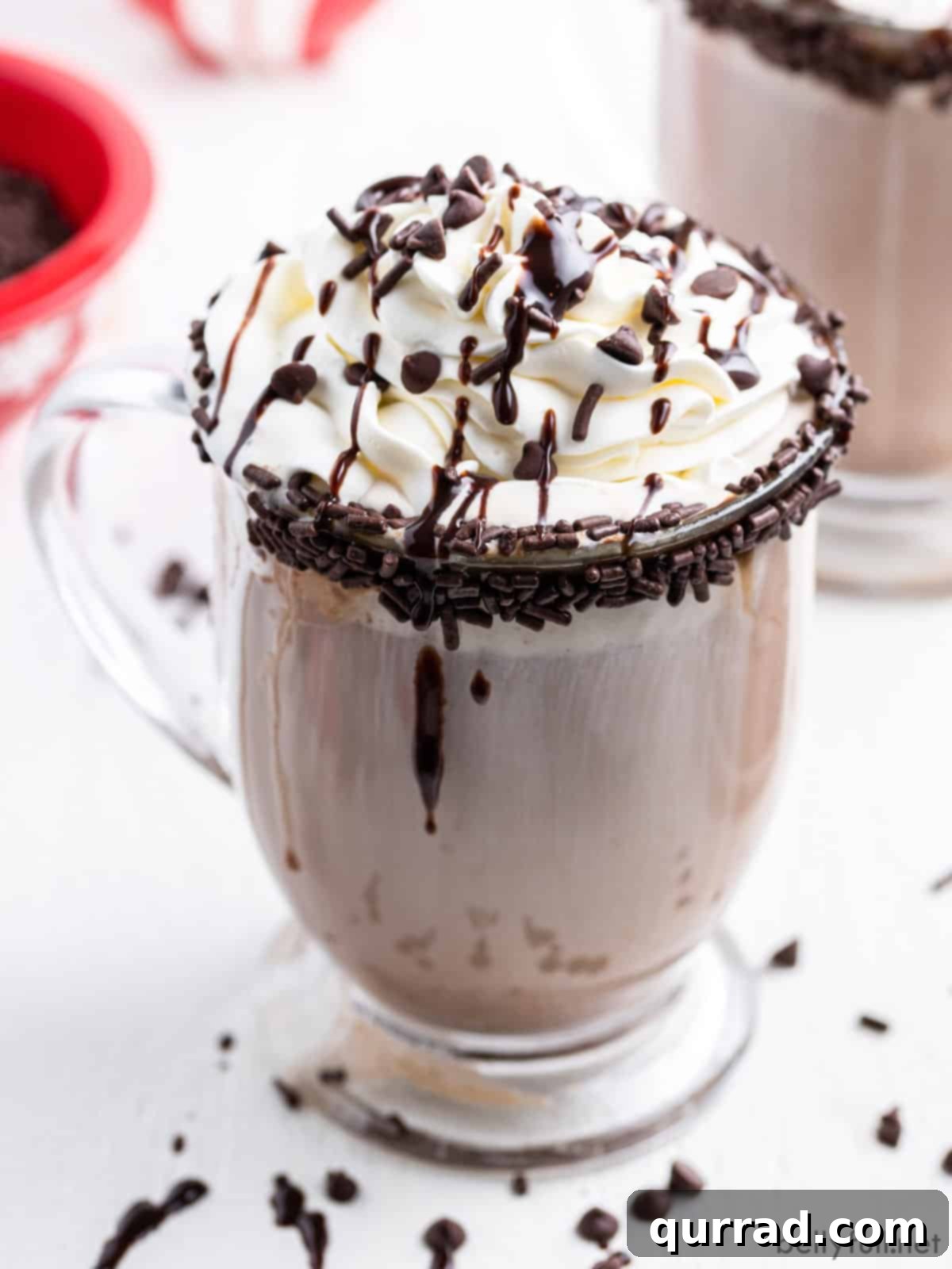 Soot-Stained Sentinel 2 A dirty snowman cocktail topped with whipped cream and chocolate syrup