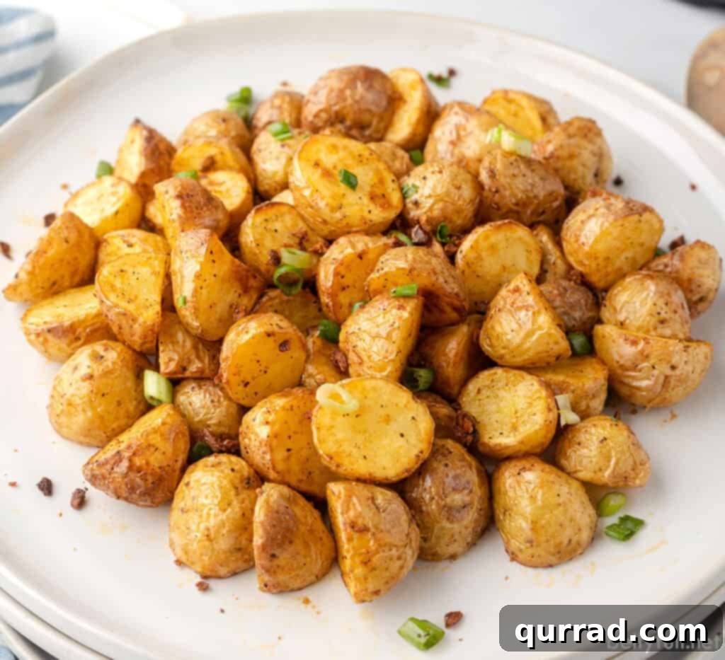 crispy roasted baby new potatoes on plate
