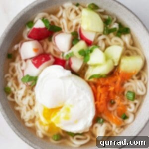Close overhead view of a bowl of hot and sour ramen soup
