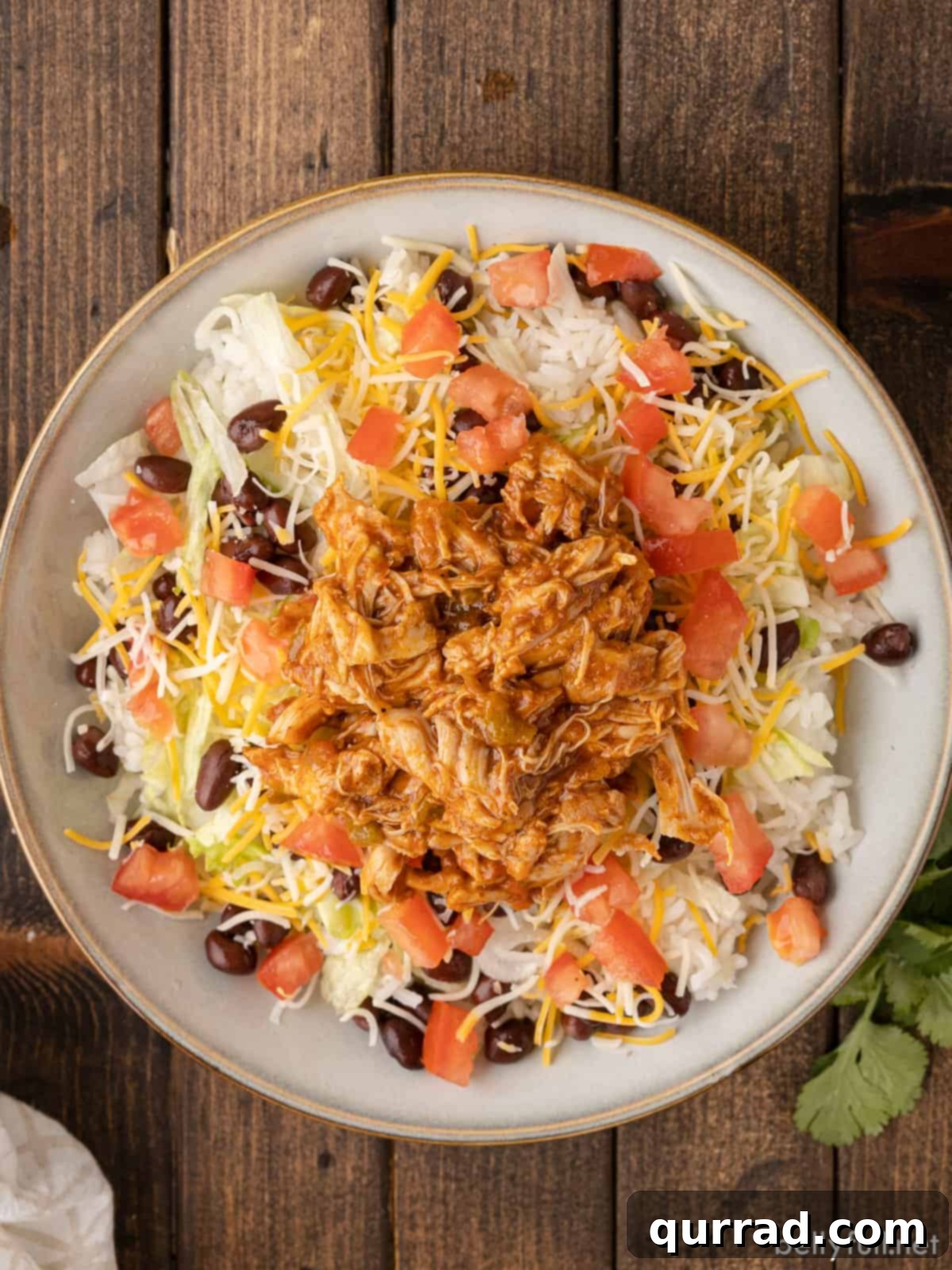 Slow Cooker Cheesy Fiesta Chicken 2 Slow cooker queso chicken on a taco salad