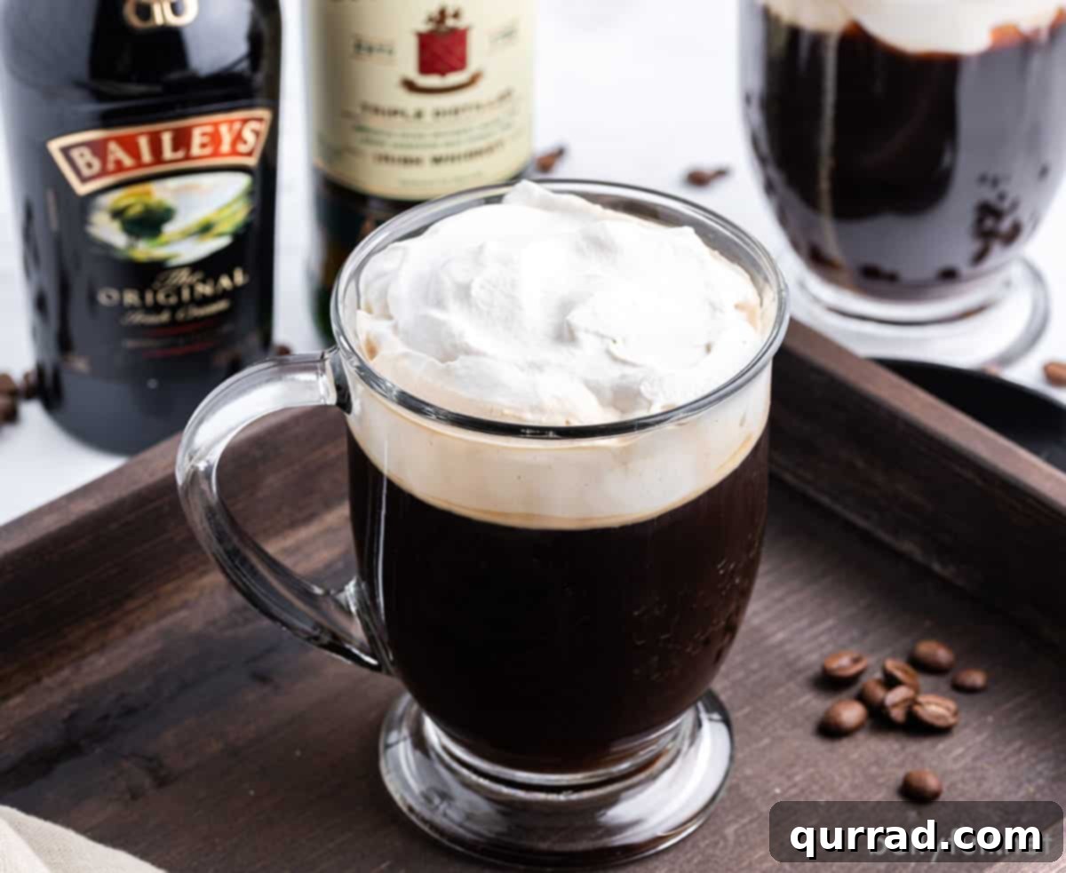 Warm Irish Embrace 5 A beautifully composed shot of a glass of Irish coffee, with bottles of Bailey's Irish Cream and Jameson Irish Whiskey in the softly blurred background, suggesting the key ingredients.