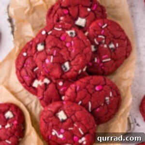Overhead view of red velvet cookies on crinkled brown parchment paper