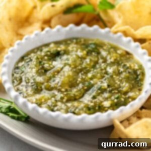 Angled view of a white bowl of salsa verde