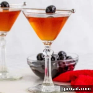 A Taste of Old New York 6 A beautifully presented Classic Manhattan cocktail, garnished with a single Luxardo cherry.