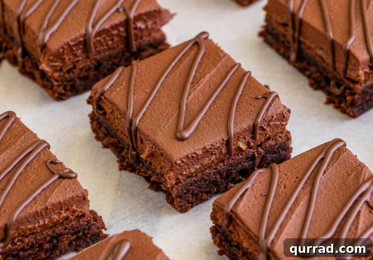 Decadent Irish Cream Brownies 3 close up frosted brownie with chocolate drizzle