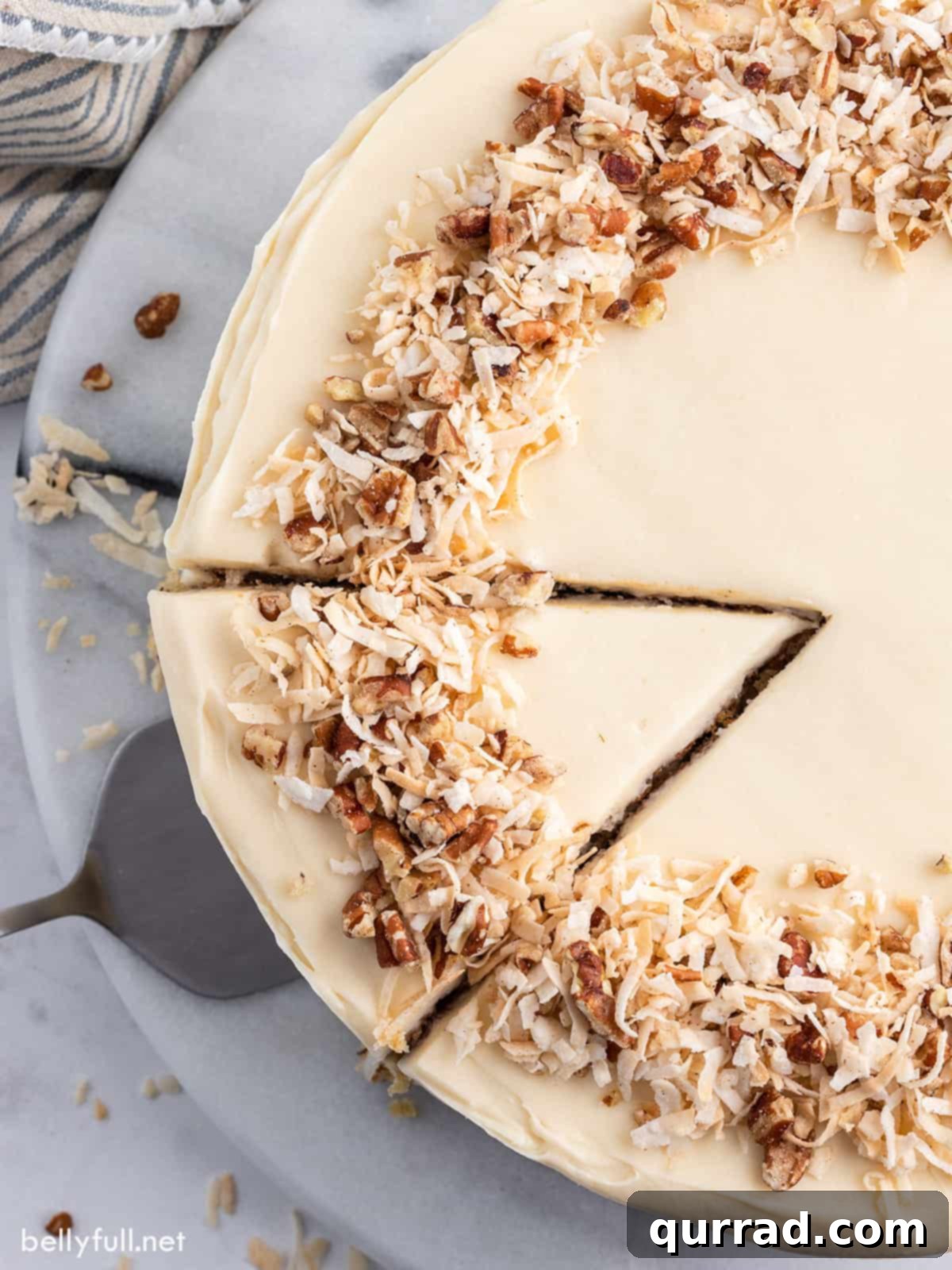 Golden Nectar Dream 4 An overhead view of a beautifully frosted Hummingbird Cake with one slice carefully cut out, ready to be enjoyed.