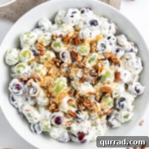 Overhead view of a bowl of creamy grape salad