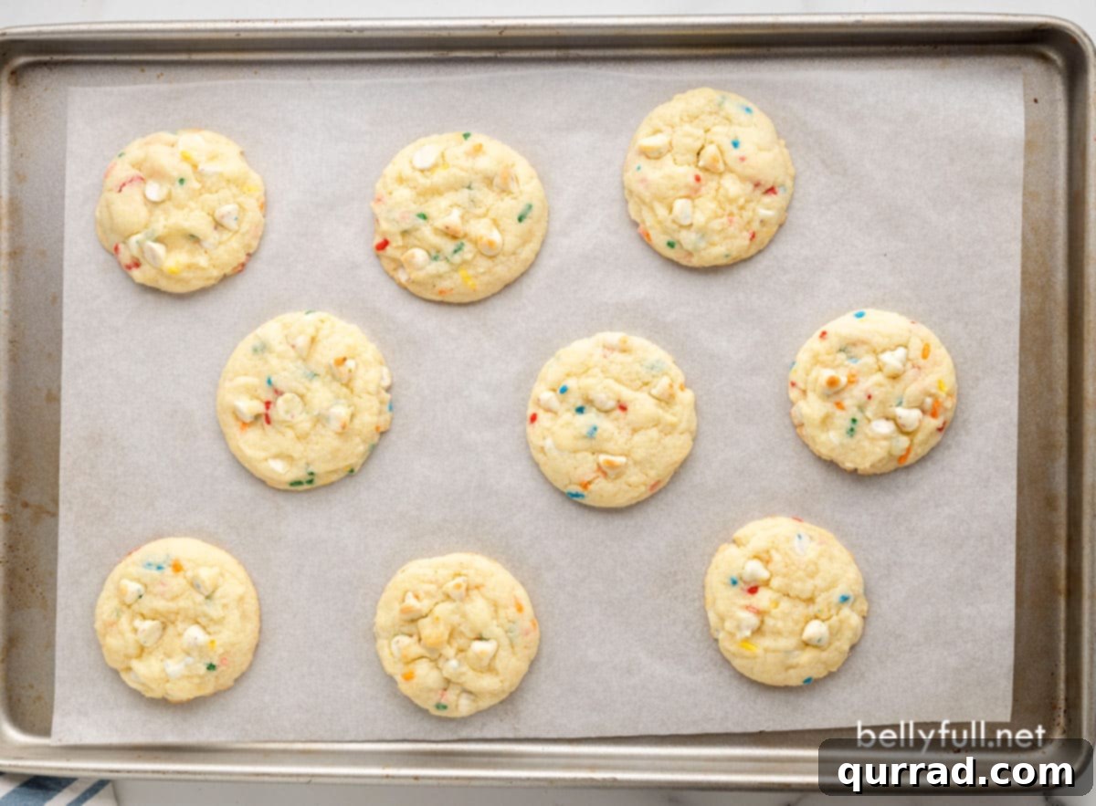Festive Cake Batter Delights 4 overhead cookies on baking sheet