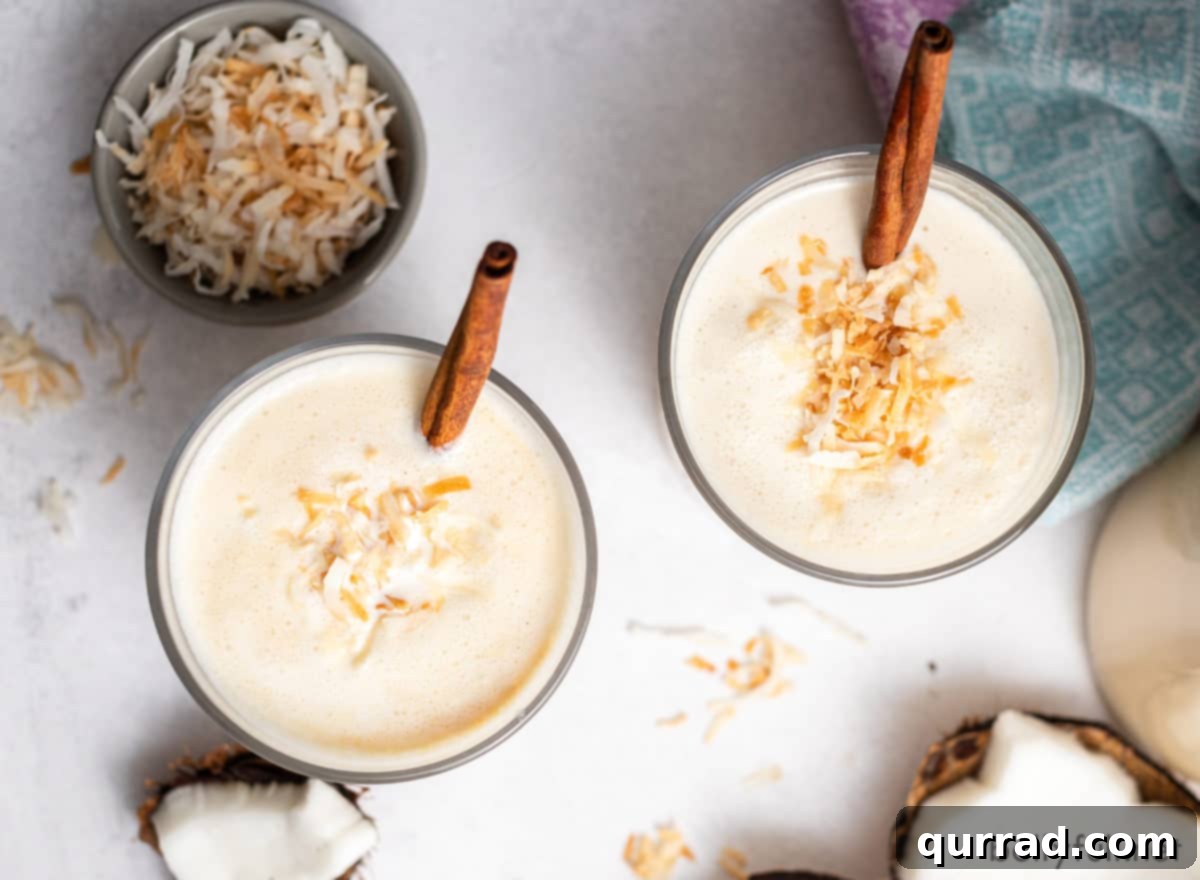 Puerto Rico's Tropical Eggnog Coquito 4 Overhead view of two glasses of coquito