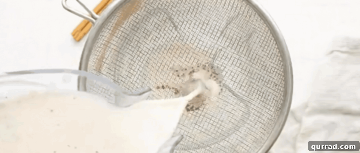 Creamy Cinnamon Mexican Horchata 5 Straining the rice mixture over a fine mesh sieve.
