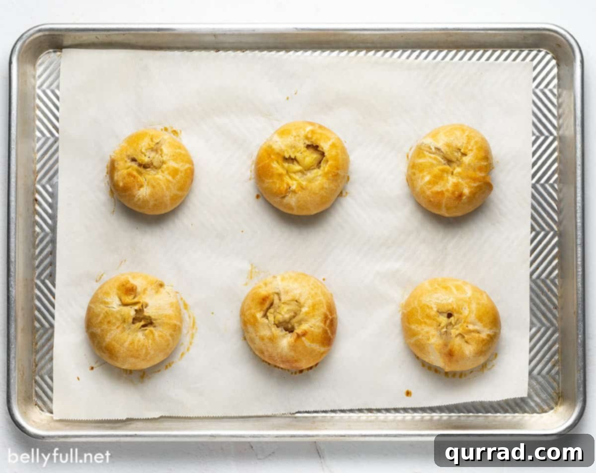 Flaky Potato Pastry 3 overhead 6 potato filled pastry on baking sheet