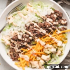 A smaller, square image of the Low Carb Big Mac Salad, showing a close-up of the ingredients and sauce.