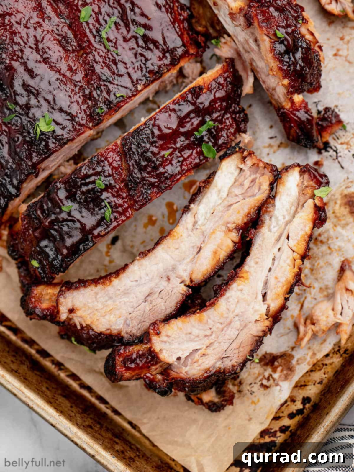 Overhead view of instant pot baby back ribs, a few on their sides showing their tenderness