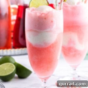 shirley temple ice cream float with straw and a lime wedge