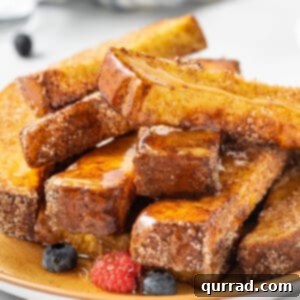 A plate of air fryer French toast sticks
