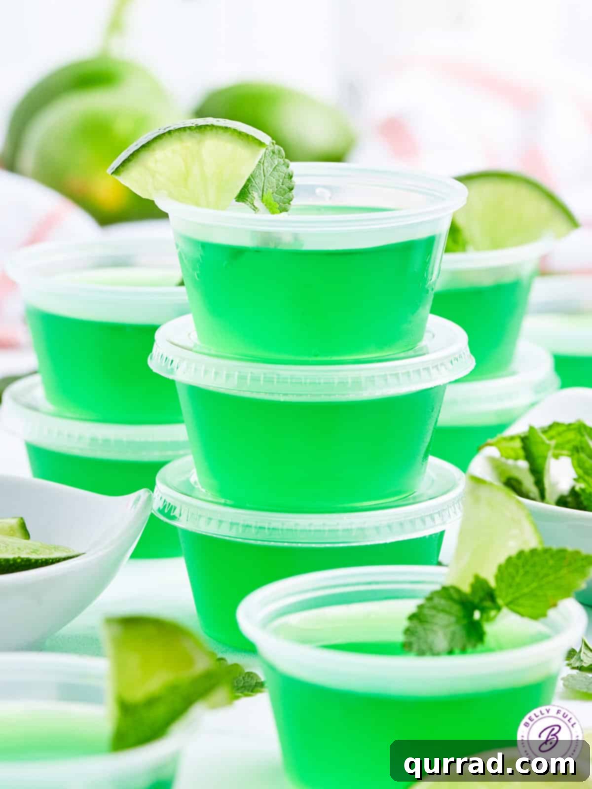 Minty Lime Gelatin Shots 2 stack of 3 green mojito jello shots with lids