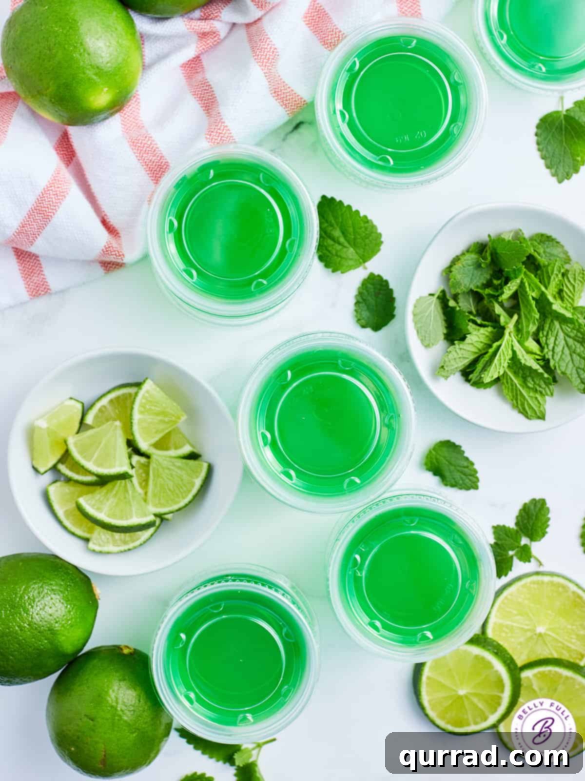 Minty Lime Gelatin Shots 4 overhead lime green jello shots with lids