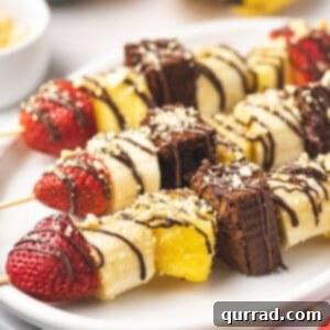 Fruity Banana Split Skewers 6 A finished Banana Split Dessert Kabob, vibrant and ready to eat.