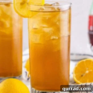 The Five-Liquor Illusion 2 A glass of long island iced tea garnished with a lemon slice