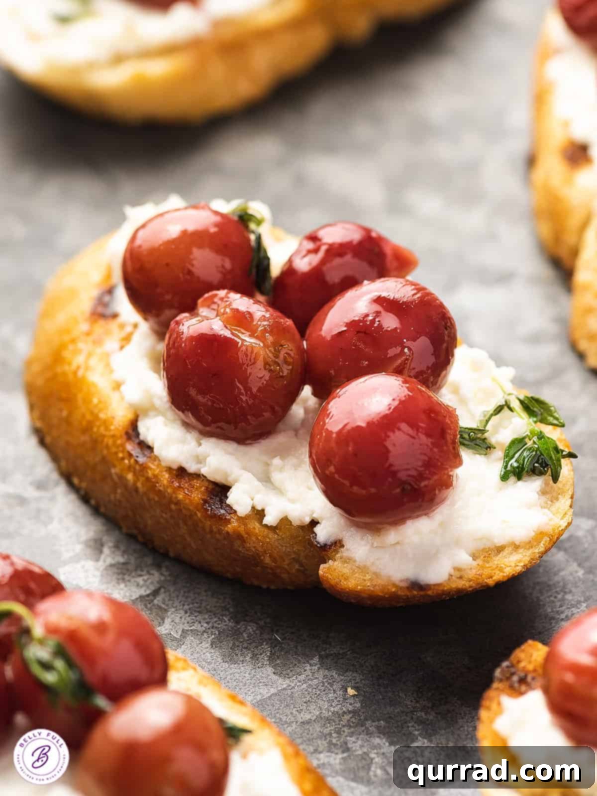 Oven Kissed Grapes 2 crostini with roasted red grapes and ricotta