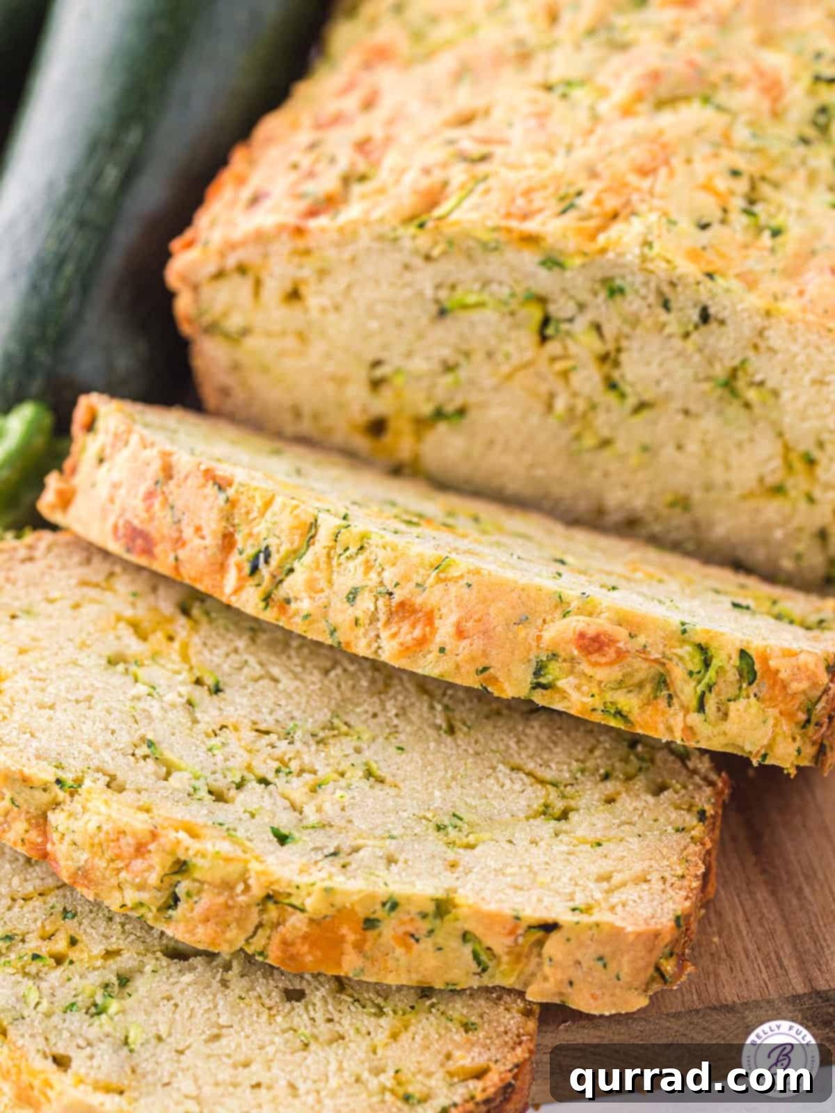 Sliced zucchini cheese bread.