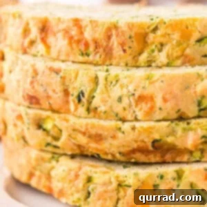 front view of 4 zucchini cheese bread slices