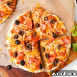 Overhead view of a Mexican pizza cut into quarters