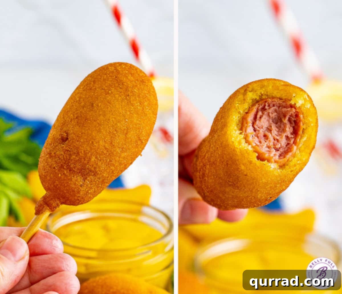 Enjoying a Perfectly Fried Mini Corn Dog A hand holding a perfectly golden mini corn dog, showcasing its crispy texture.