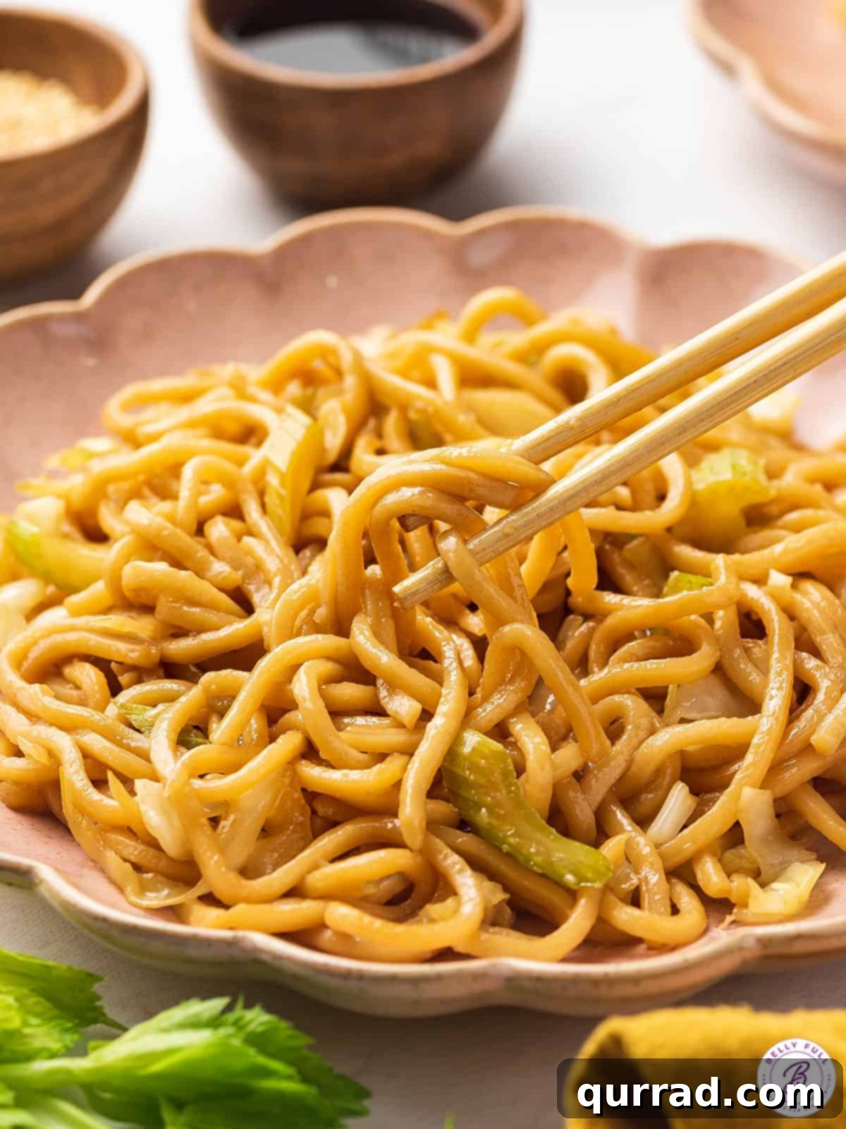 This copycat Panda Express Chow Mein recipe comes together in as little as 20 minutes! Enjoy with your other carryout favorites. Chop sticks on a plate of chow mein, perfectly stir-fried and ready to eat.