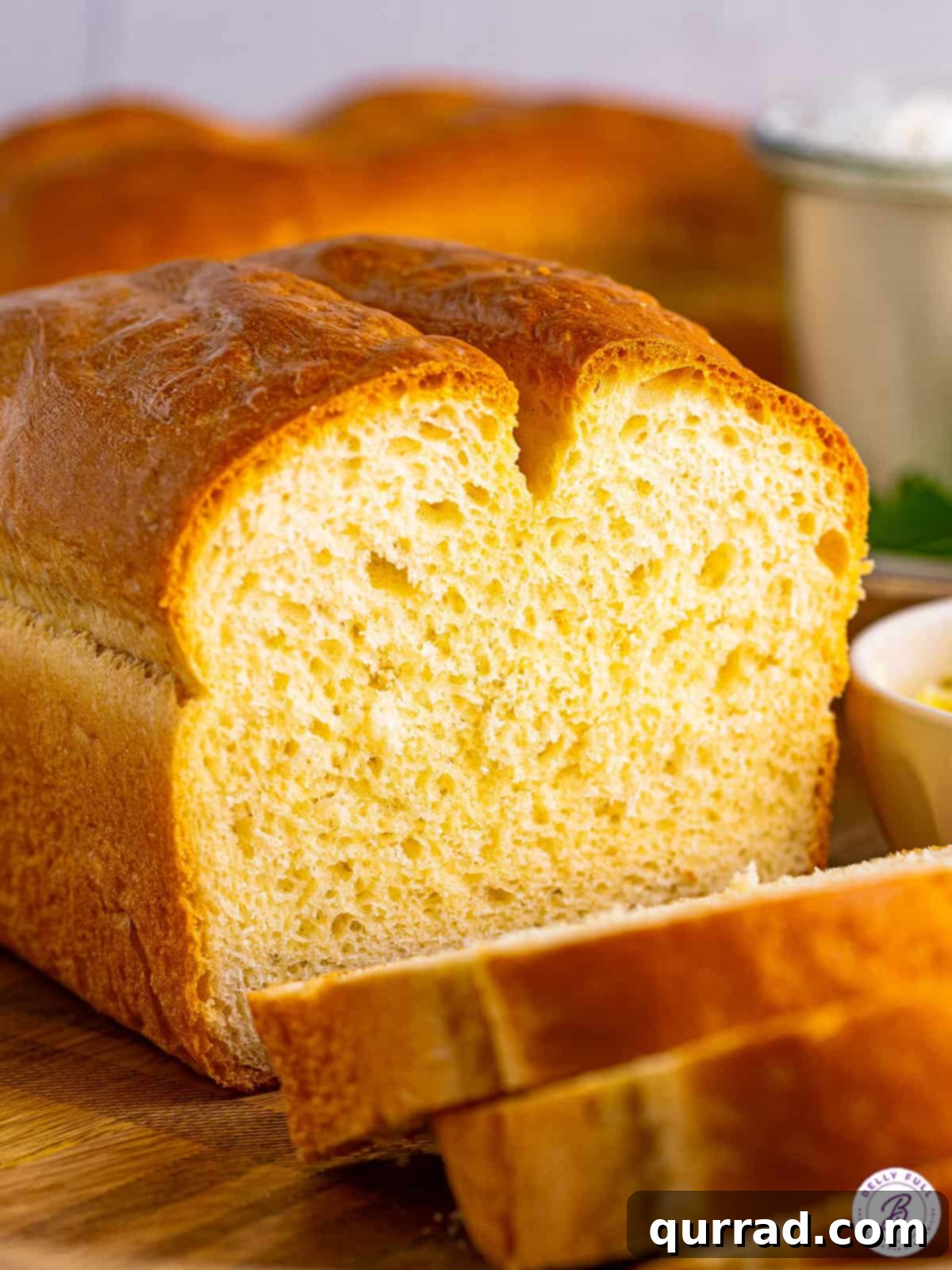 Close-up at a sliced white bread loaf