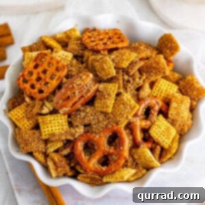 Irresistible Cinnamon Sugar Crunch 2 Overhead view of a bowl of cinnamon sugar chex mix