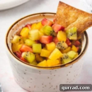 Fruit Salsa and Pie Crust Chips 7 diced summer fruit in bowl with cinnamon triangle chip