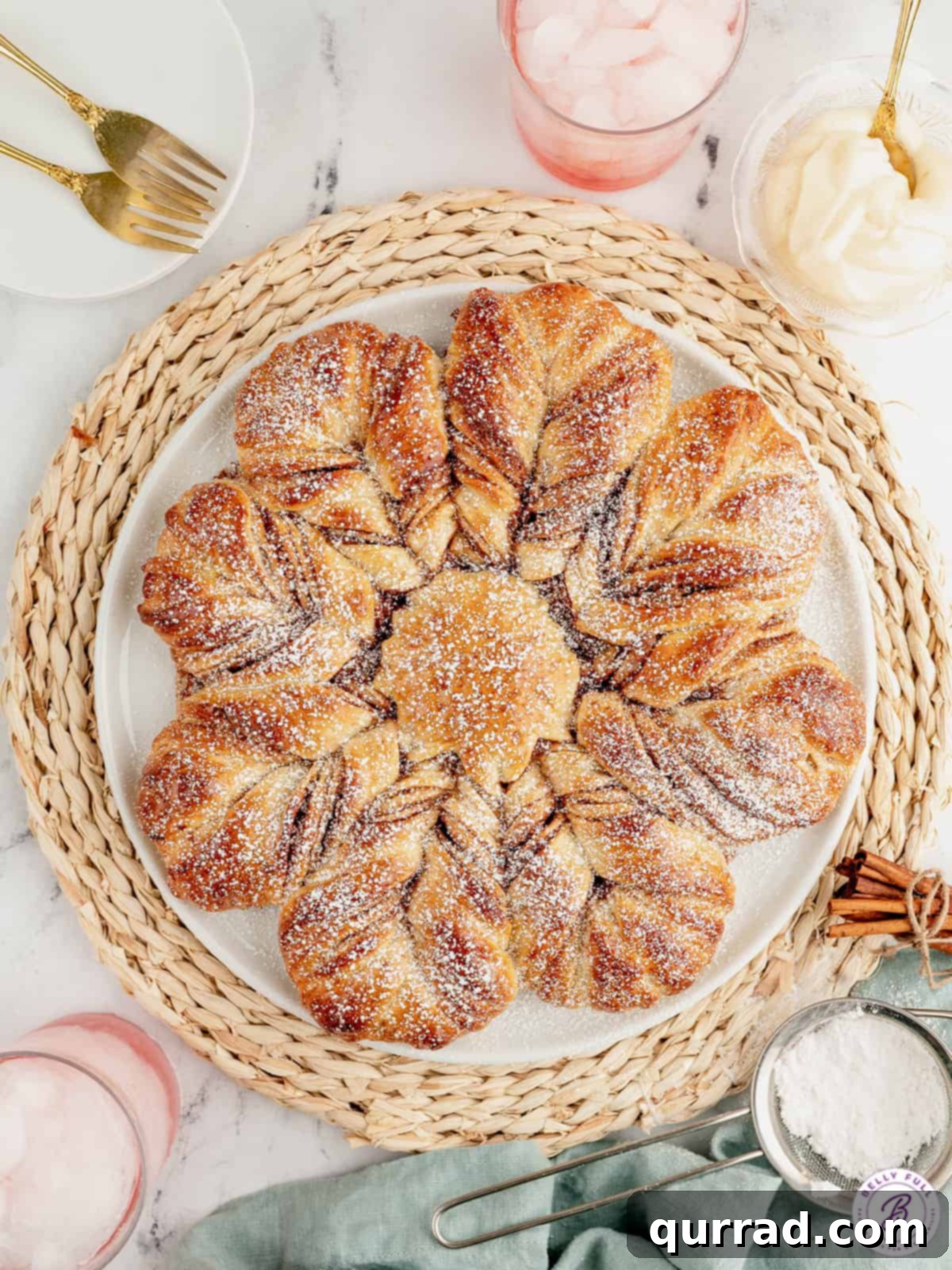 A closer look at the stunning twisted design of Cinnamon Sugar Star Bread. Close-up overhead view of the twisted layers of cinnamon sugar star bread