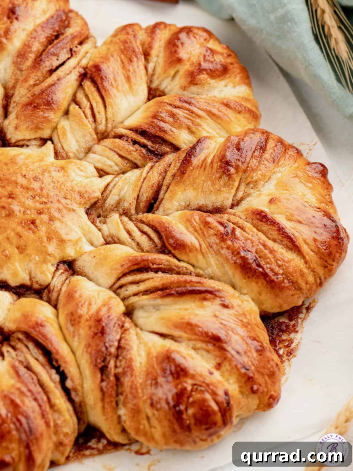 The perfectly baked, crispy edges of Cinnamon Sugar Star Bread. Close up view of the crispy, golden edges of the cinnamon sugar star bread