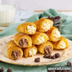 A plate piled with vanilla and chocolate cream horns
