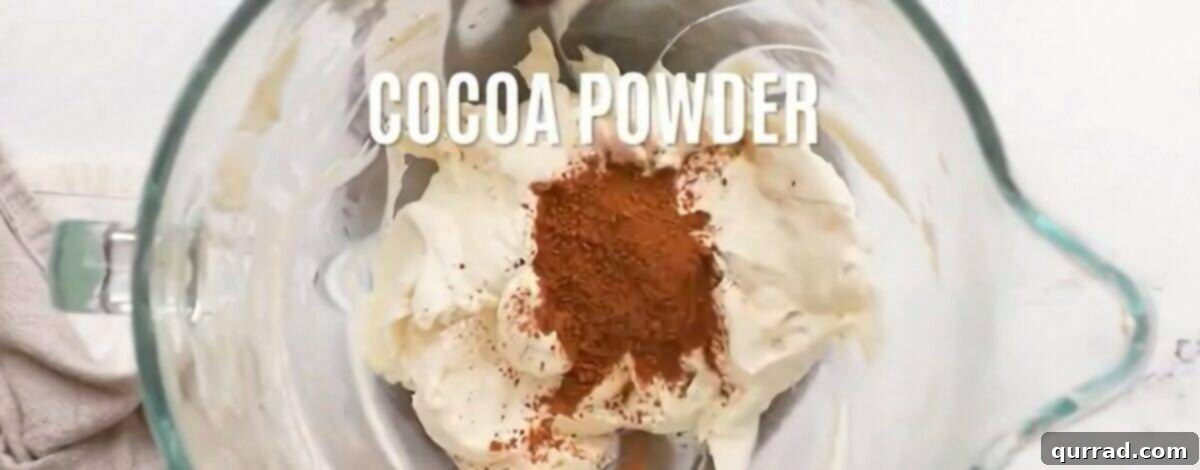 Making the chocolate cream filling in a blender, showing the smooth, rich texture.