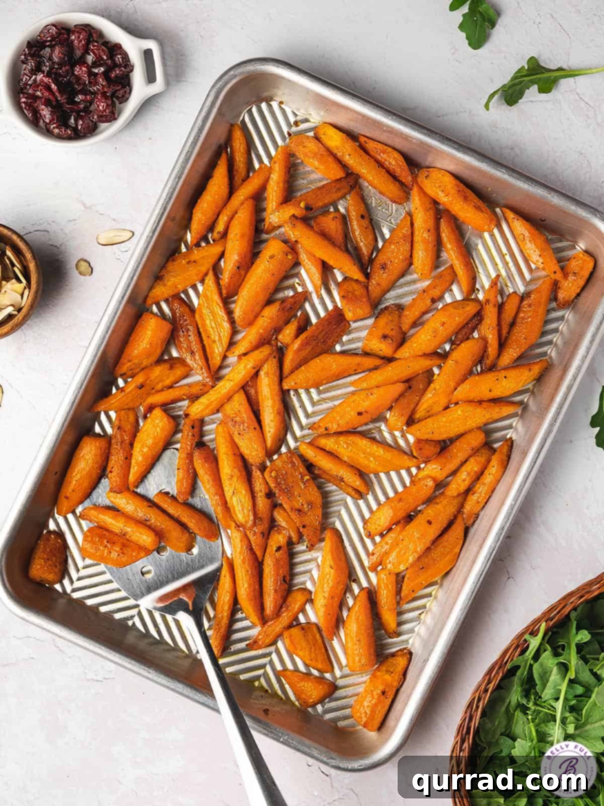 Roasted carrots on a baking sheet