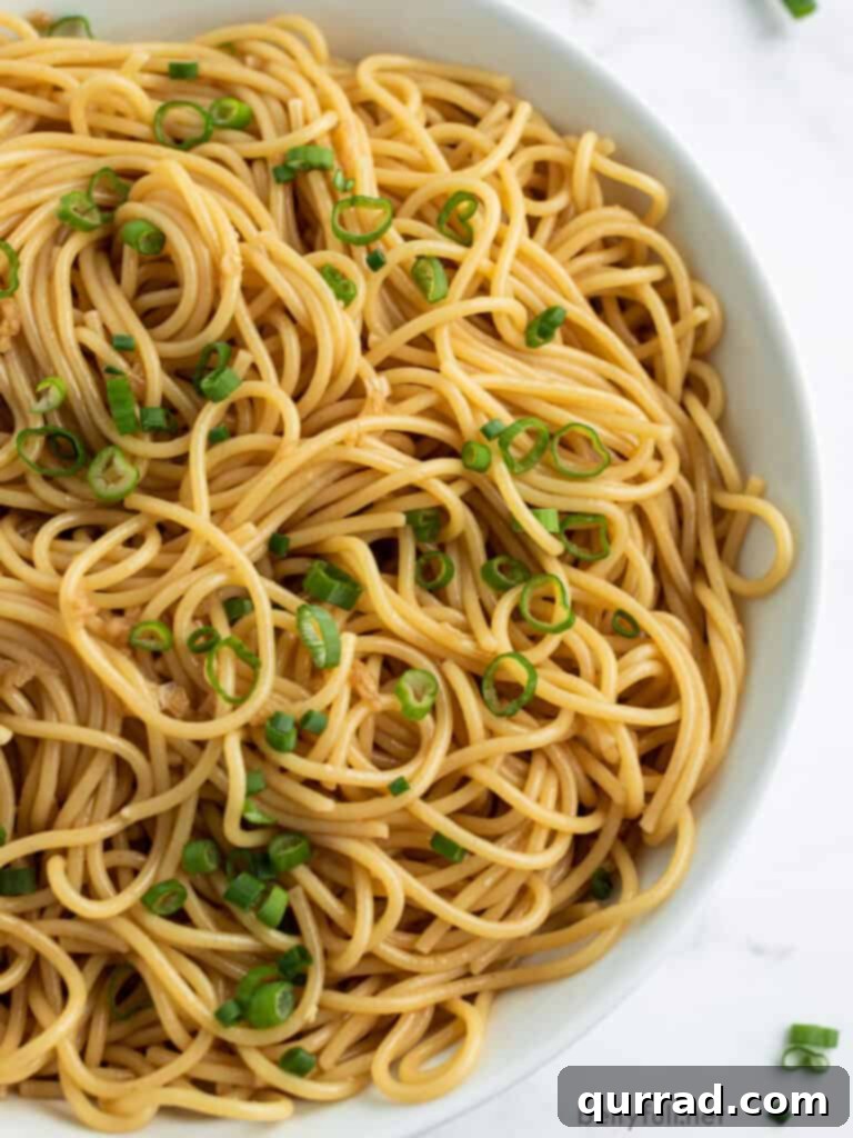 Simply Delicious Sesame Noodles 3 big bowl of sesame noodles sprinkled with diced scallions