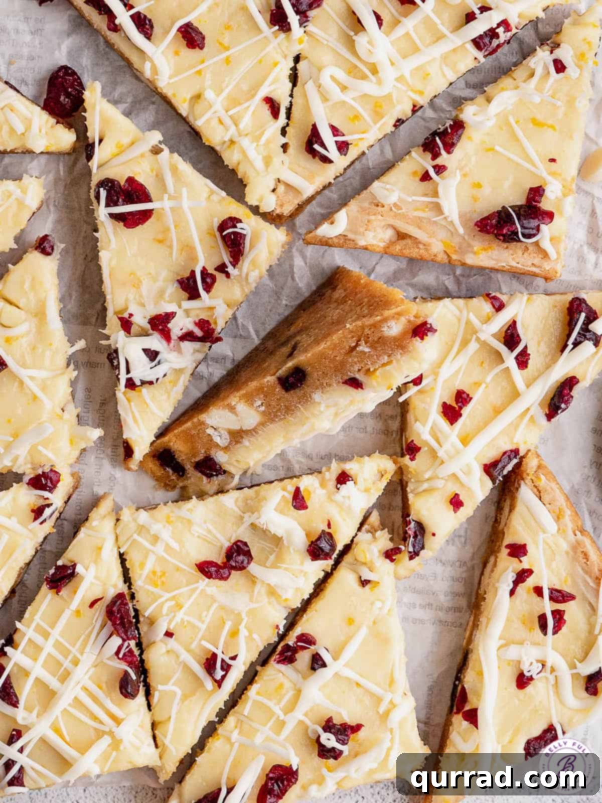 Overhead view of cranberry bliss bars, showcasing their vibrant color and delicious frosting.