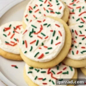 Lofthouse sugar cookies with festive sprinkles on a white plate