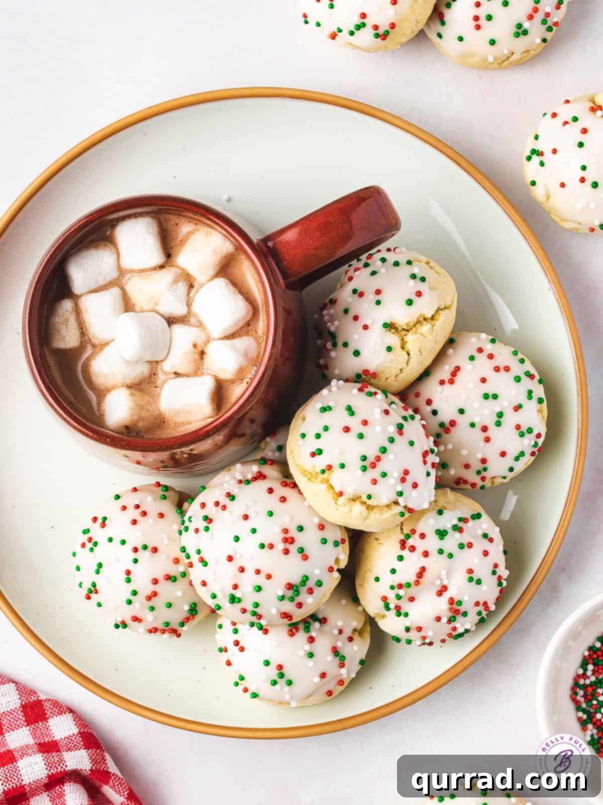 Sweet Italian Christmas Treats 4 overhead pile of Christmas sugar cookies with cup of hot cocoa