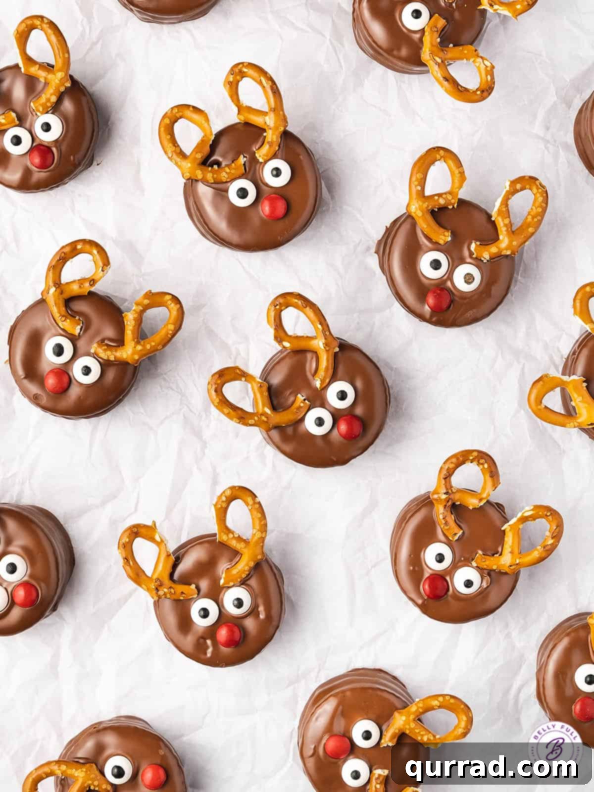 Festive Reindeer Ritz Treats 3 Overhead view of several chocolate-covered Reindeer Ritz Cracker Cookies arranged beautifully on a platter.